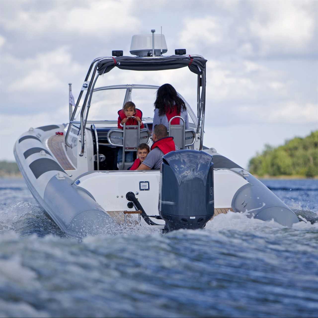 Family in a used motorboat