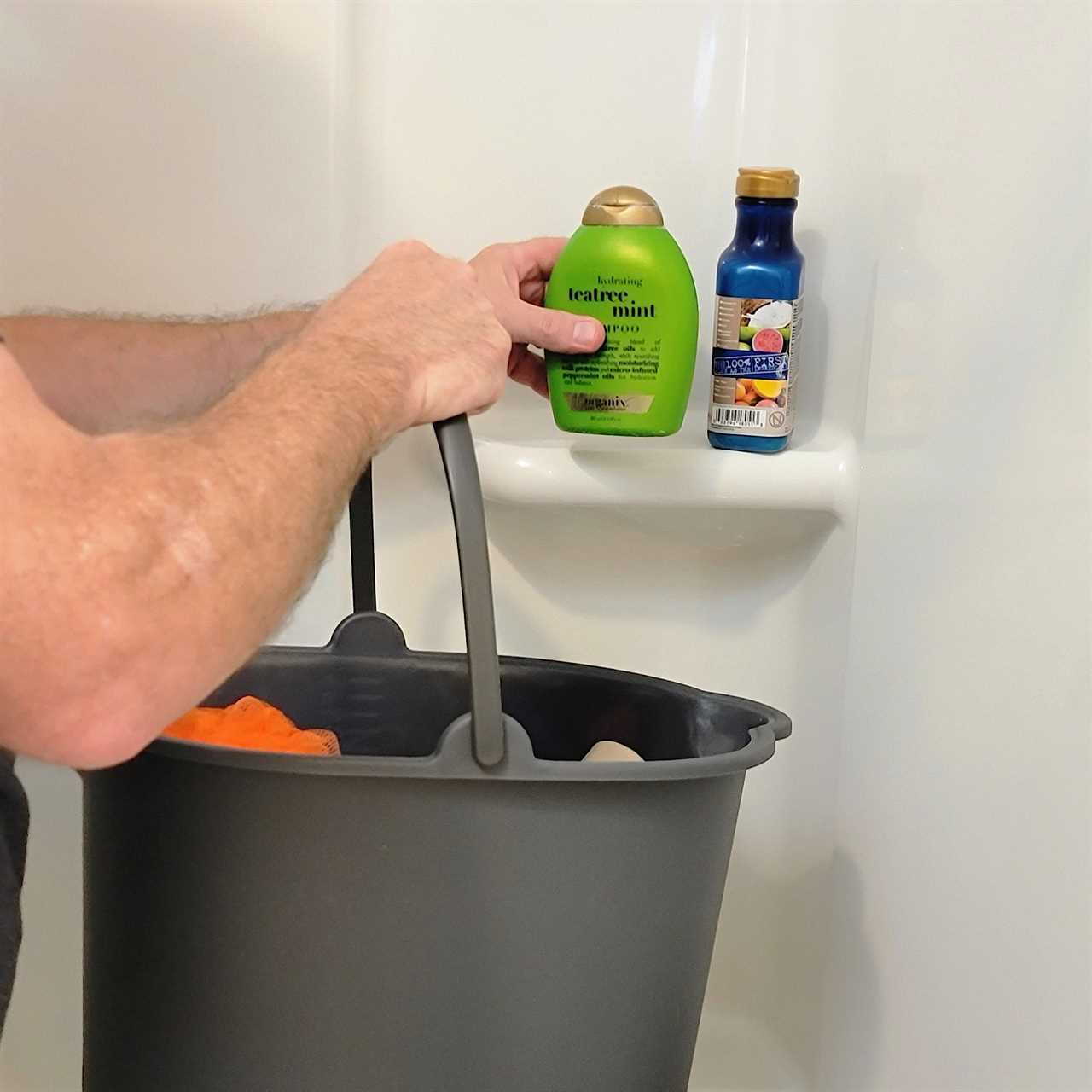 removing products from shower in preparation for cleaning