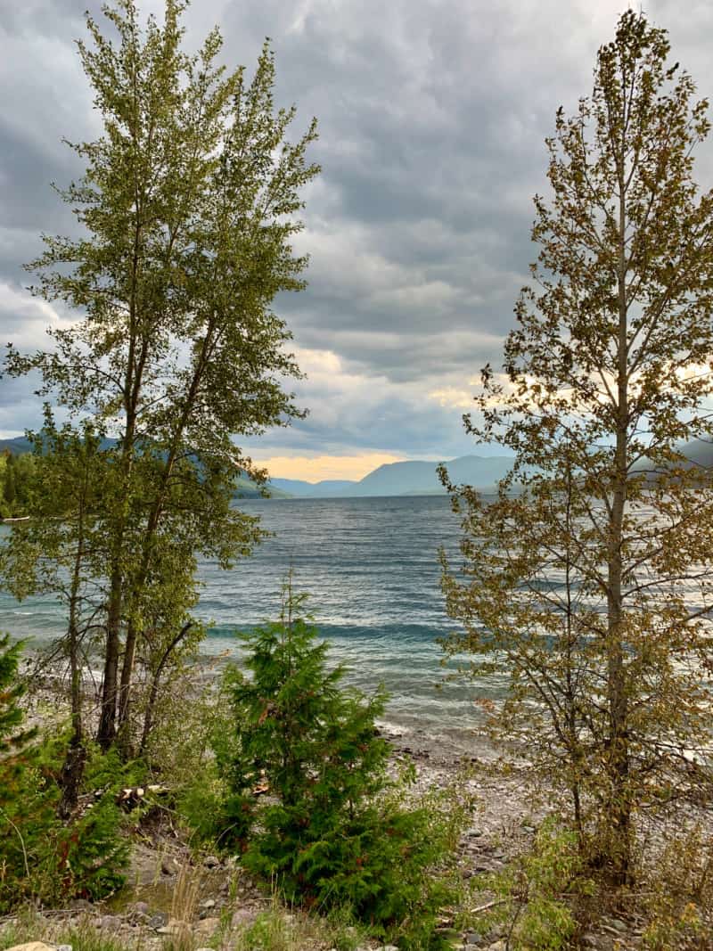 Looking through some trees at Lake McDonald in Glacier National Park, Montana