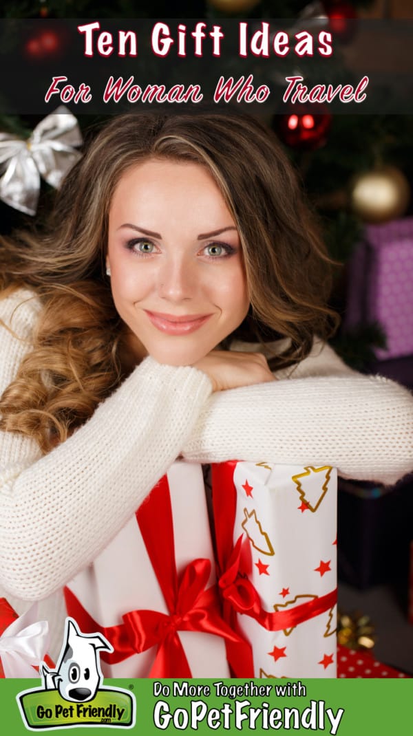 Woman in a Christmas scene holding a gift