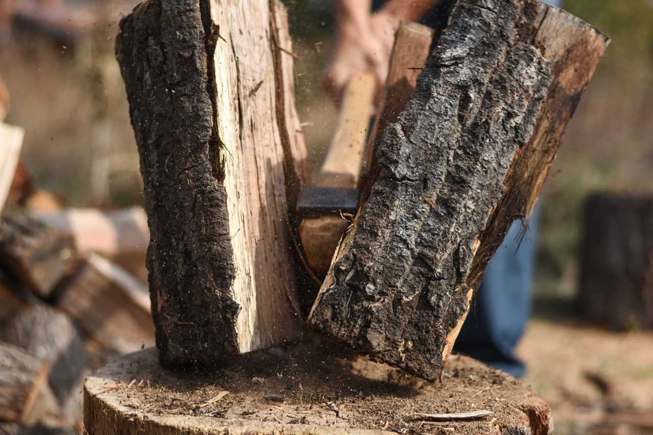 Man chopping wood for firewood for the winter 