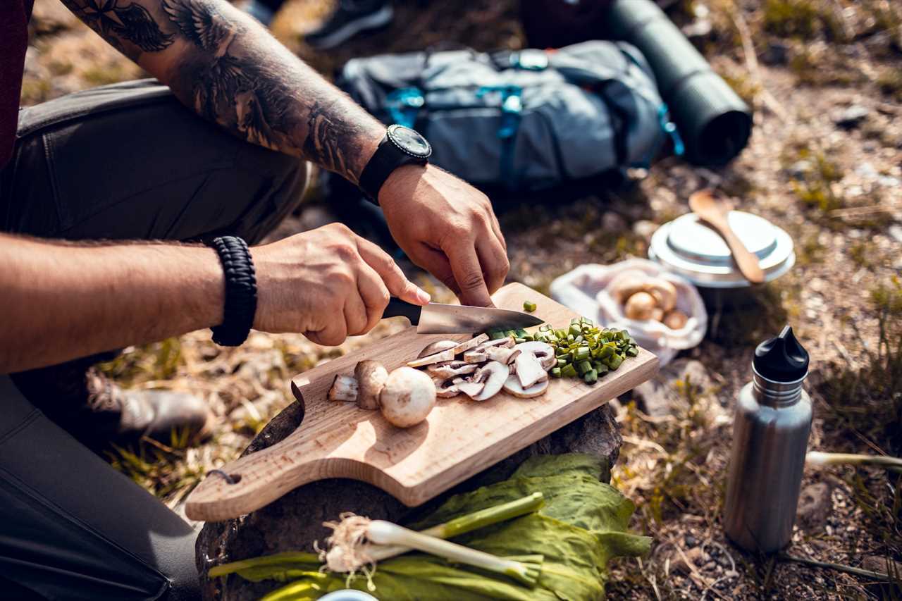 Chopping fresh vegetables for campfire cooking