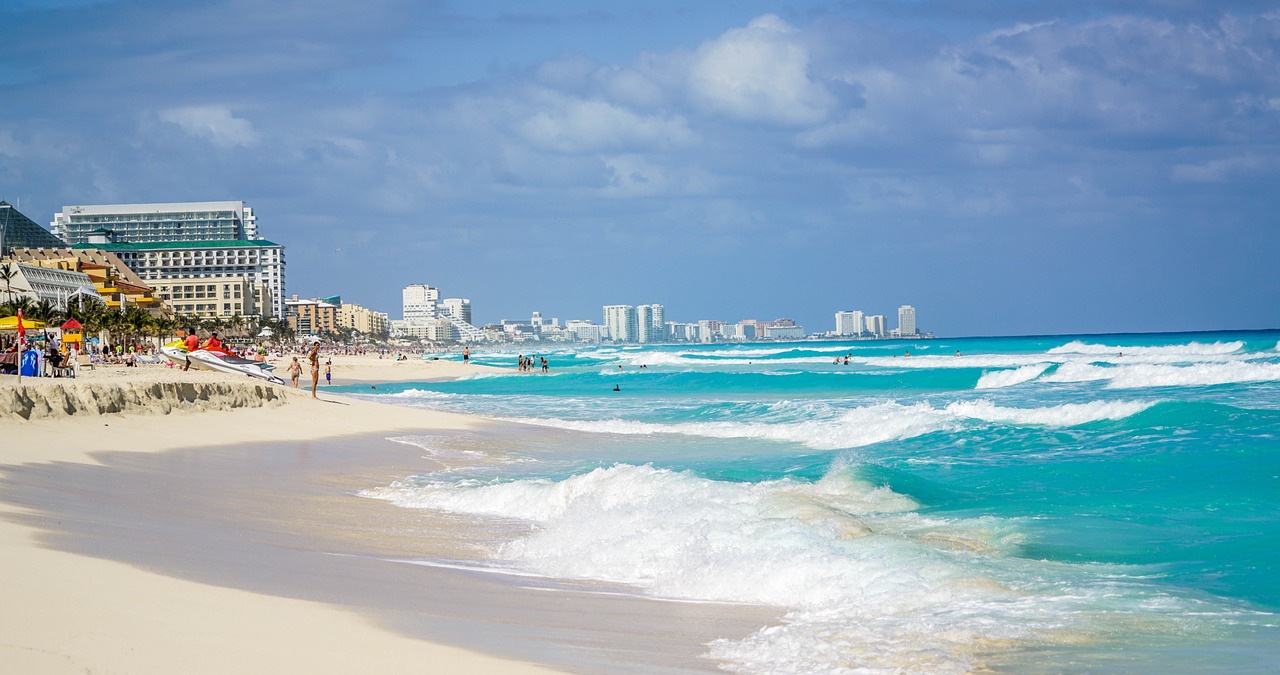 blue beach with white sand in Mexico