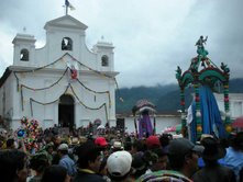 A cofradi­a makes its way to the church in Nebaj, Guatemala