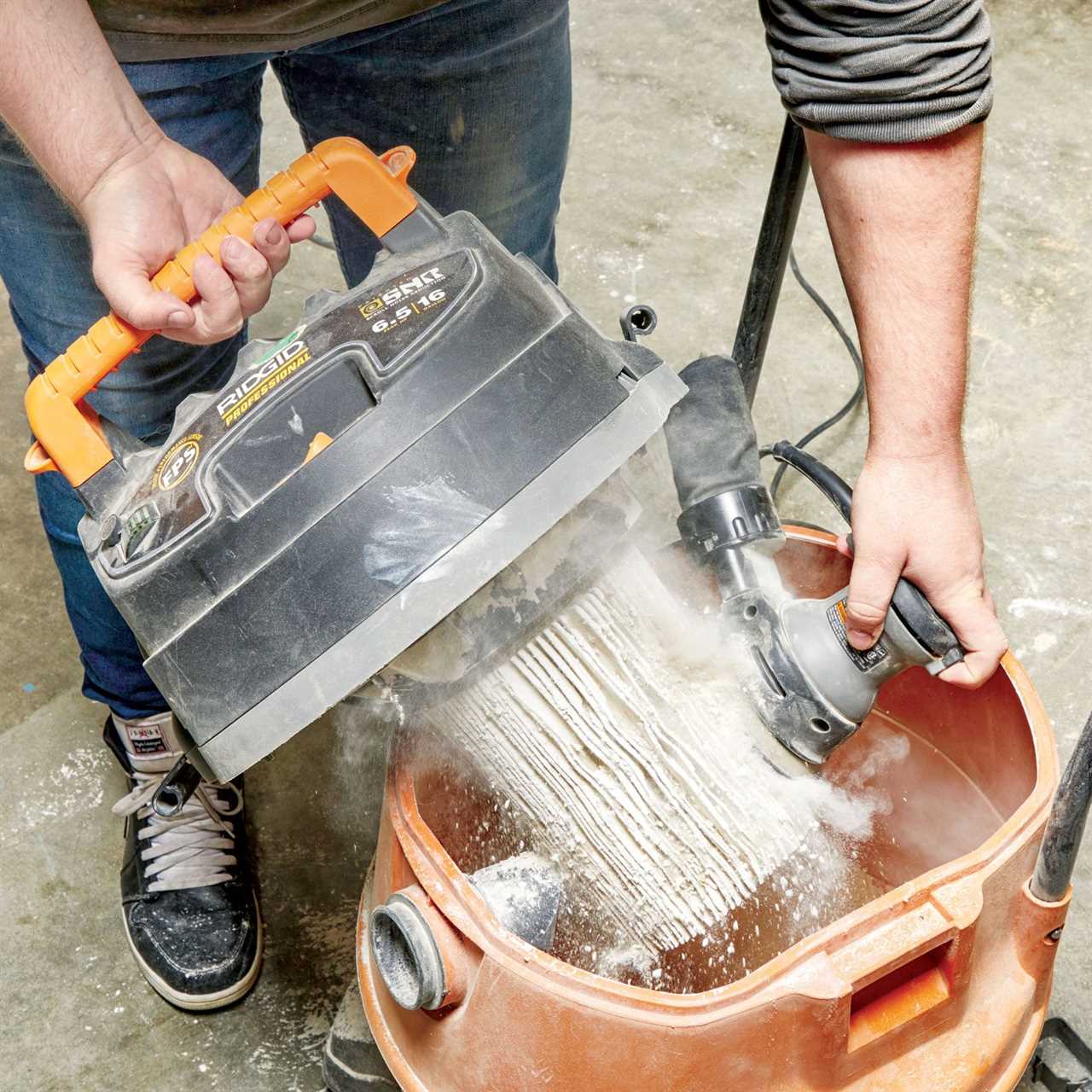 using orbital sander to clean filter of shop vac 