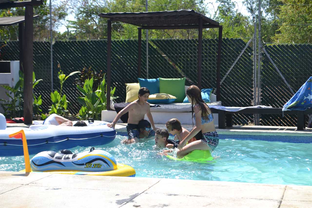 teenage pool party at the beach - guatemala beaches