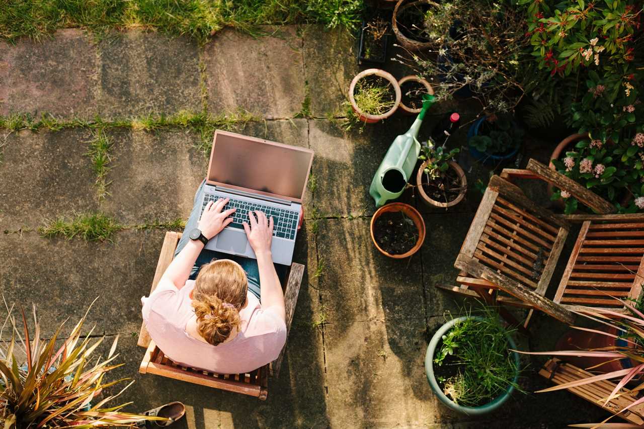 Woman working from home in her garden