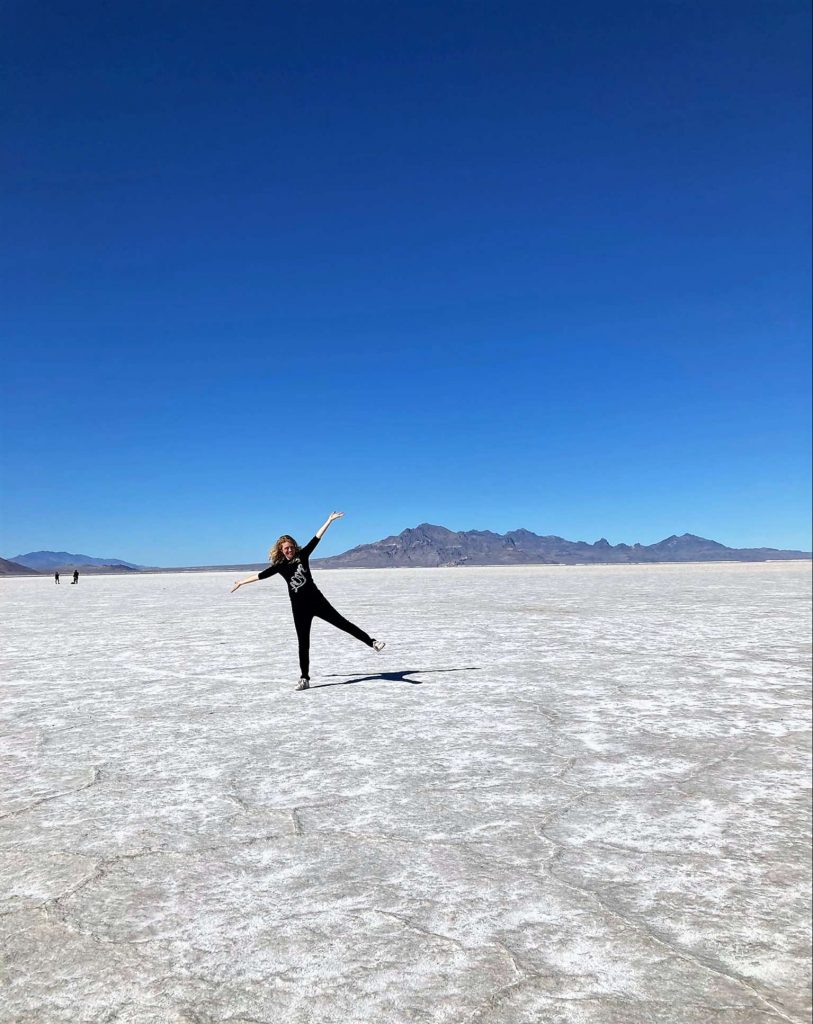 woman having fun at the Bonneville Salt Flats in salt lake city