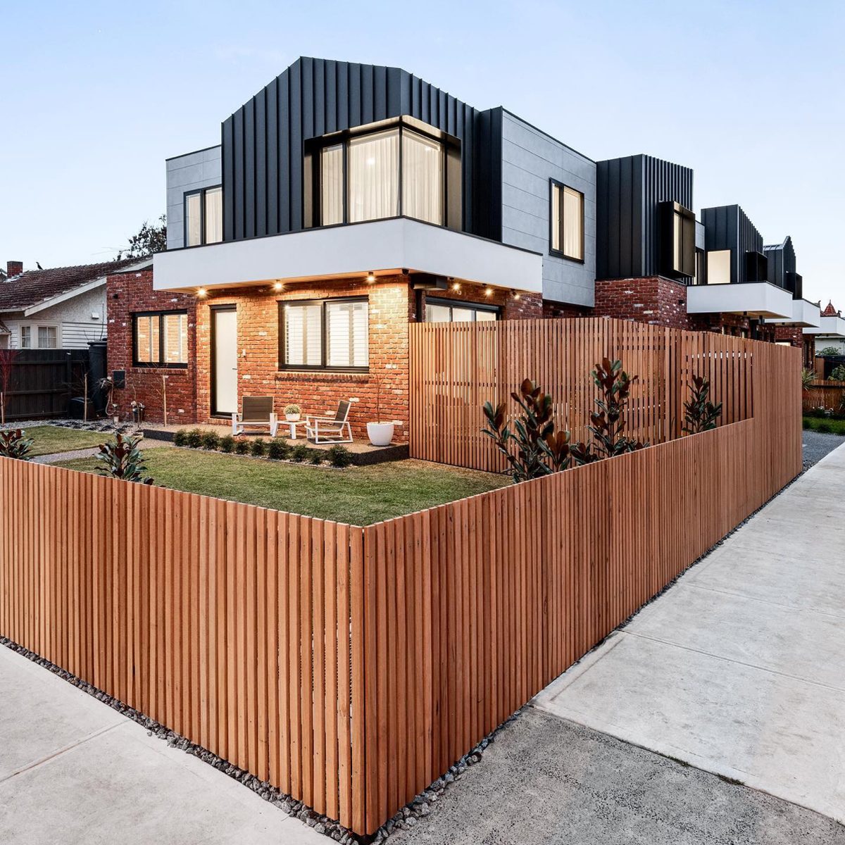 Vertical Wood Plank Fence Courtesy @abela Design And Construction Via Instagram