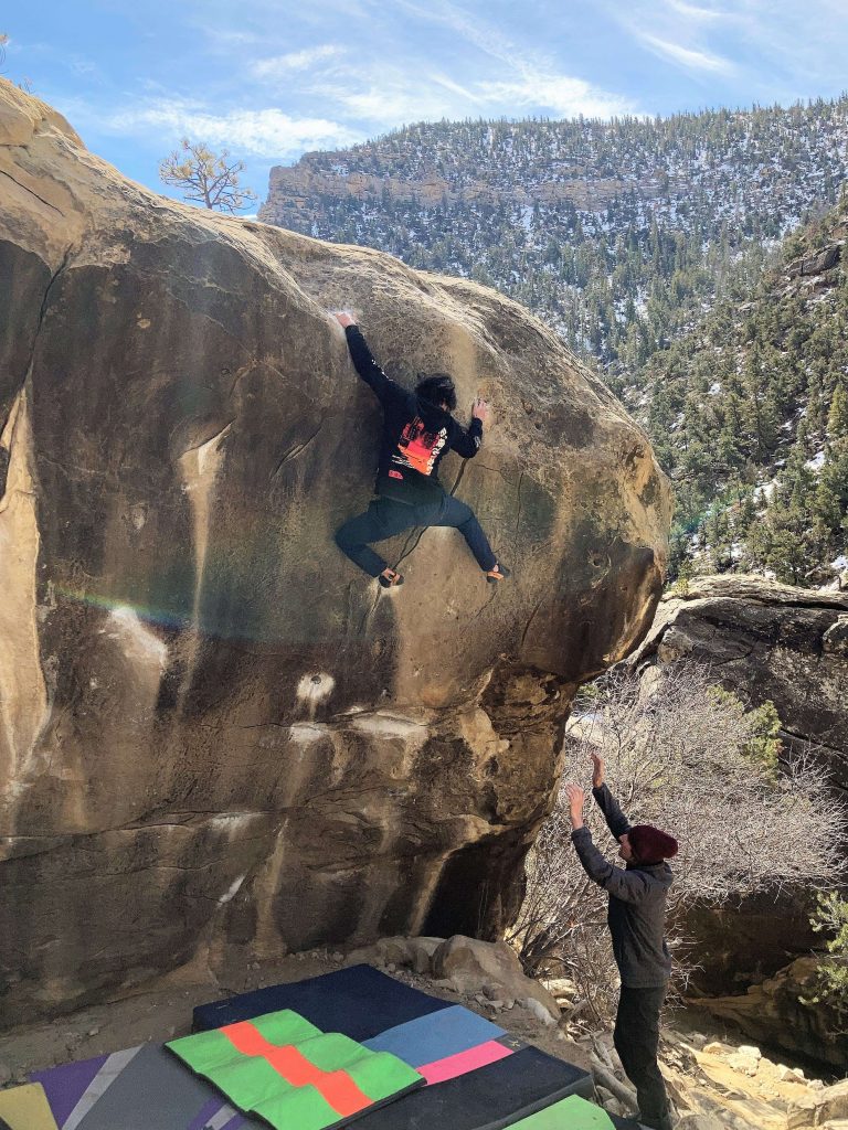 a guys doing bouldering in joe valley utah