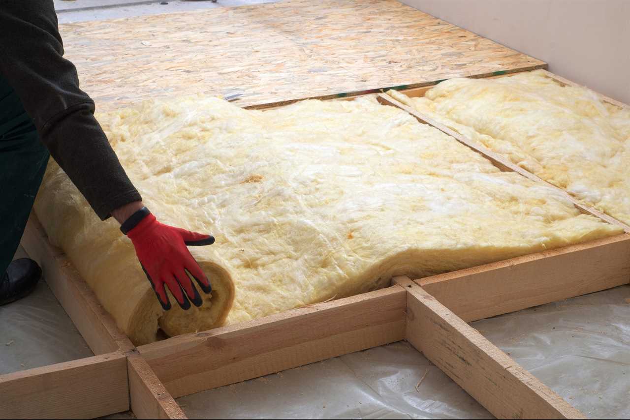 Work composed of mineral wool insulation in the floor, floor heating insulation , warm house, eco-friendly insulation, a builder at work