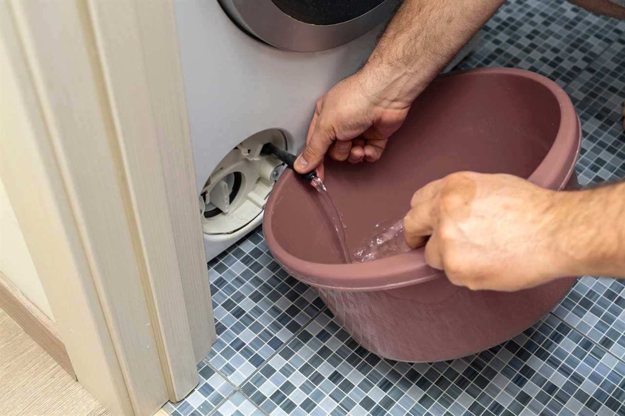 the filter of the washing machine is clogged. Plumber repairs washing machine.