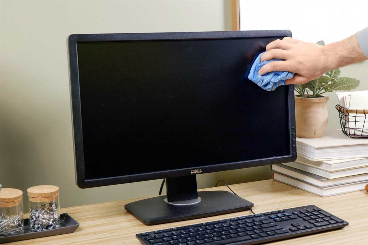 How To Clean A Computer Screen And Keyboard Wipe screen with dry microfiber cloth