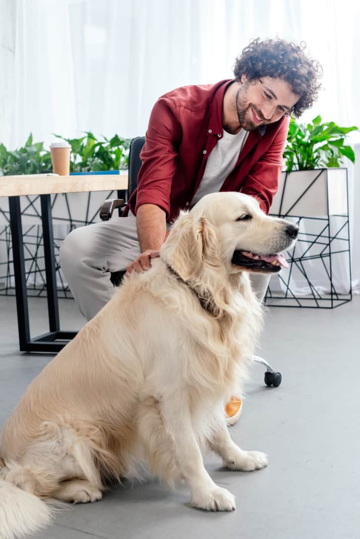 Man and Dog Getting Coffee at a dog friendly café in San Diego