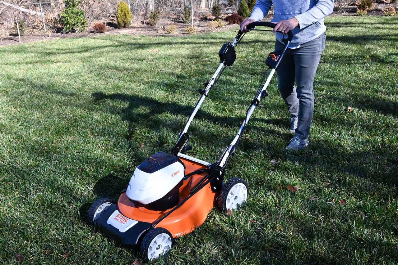 A person cutting grass through Electric-Mower 